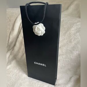 Chanel Black Bag with White Camellia